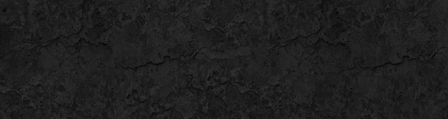 Dark, textured concrete wall with rugged, weathered surface.